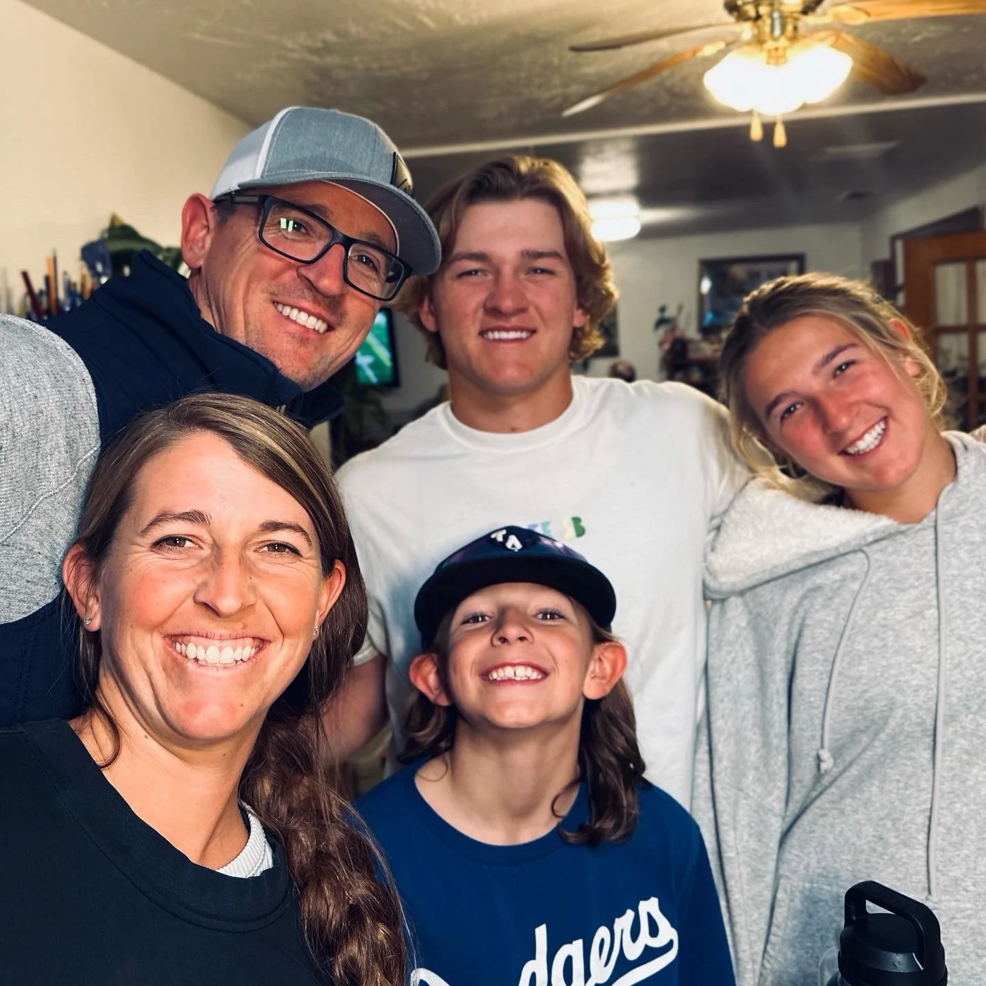 Brandon, Chantel and their three children smiling in a family selfie