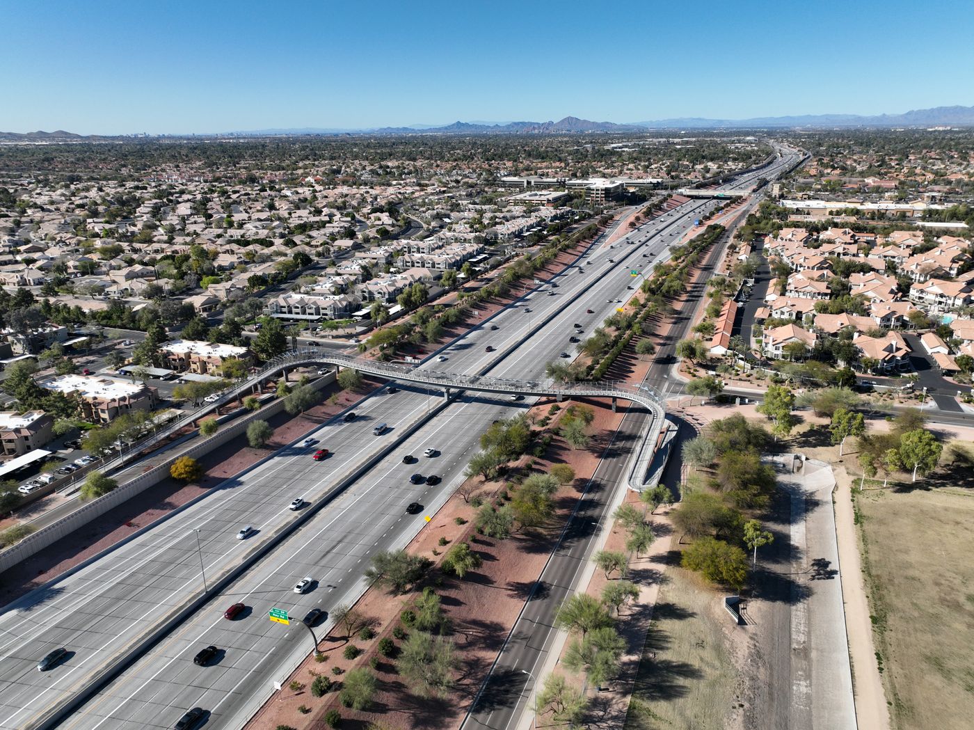 Chandler homes and roads beneath clear Arizona skies